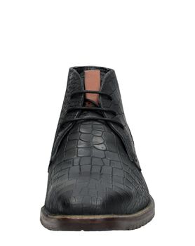 Herenschoenen gekleed