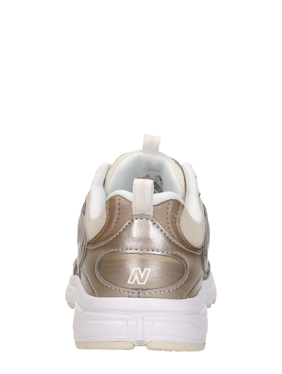 New Balance - 408 – goudkleur – foto 3 van 4