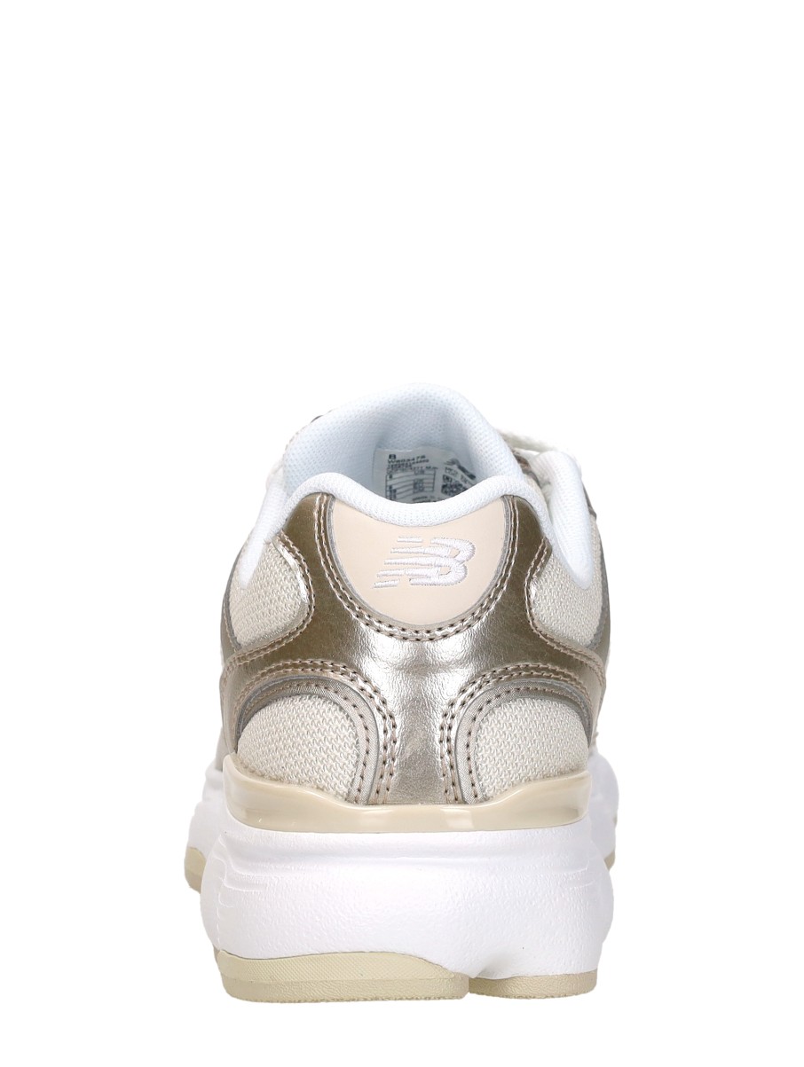 New Balance - 603 – goudkleur – foto 3 van 4