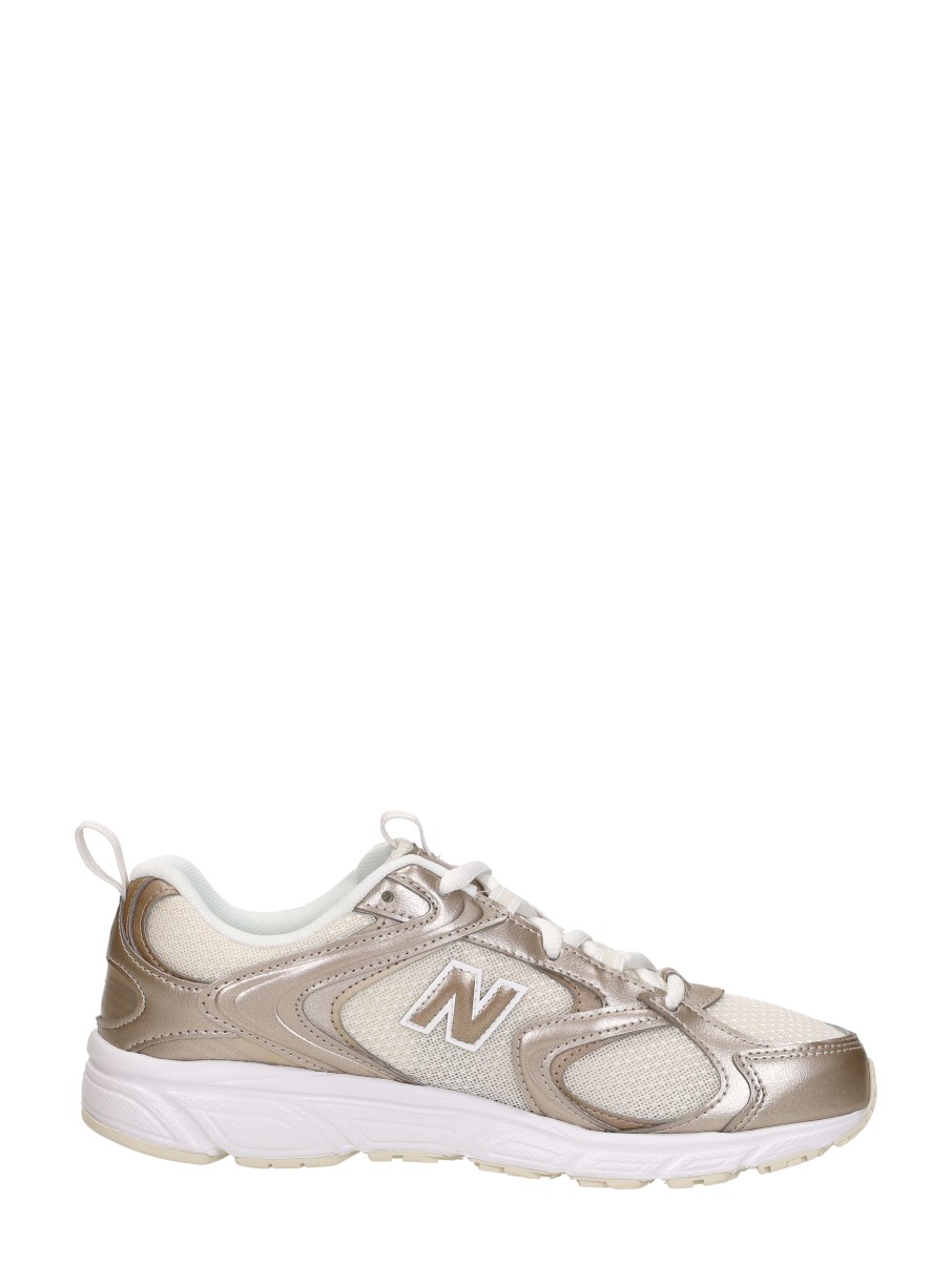 New Balance - 408 – goudkleur – foto 4 van 4